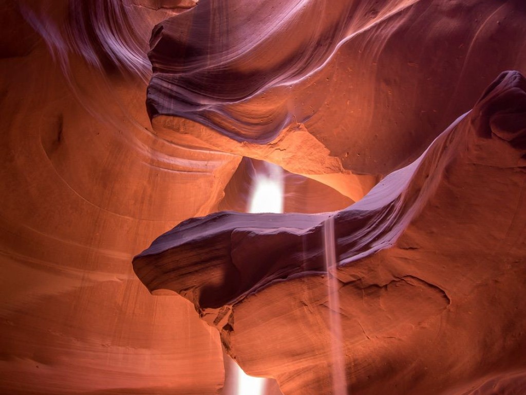 Antelope canyon lit by sunbeams